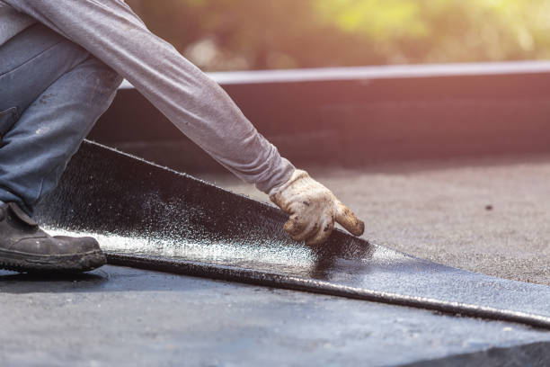 Professional Basement Waterproofing technician working in Rossville, KS